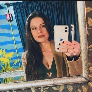 Gina Tomaine